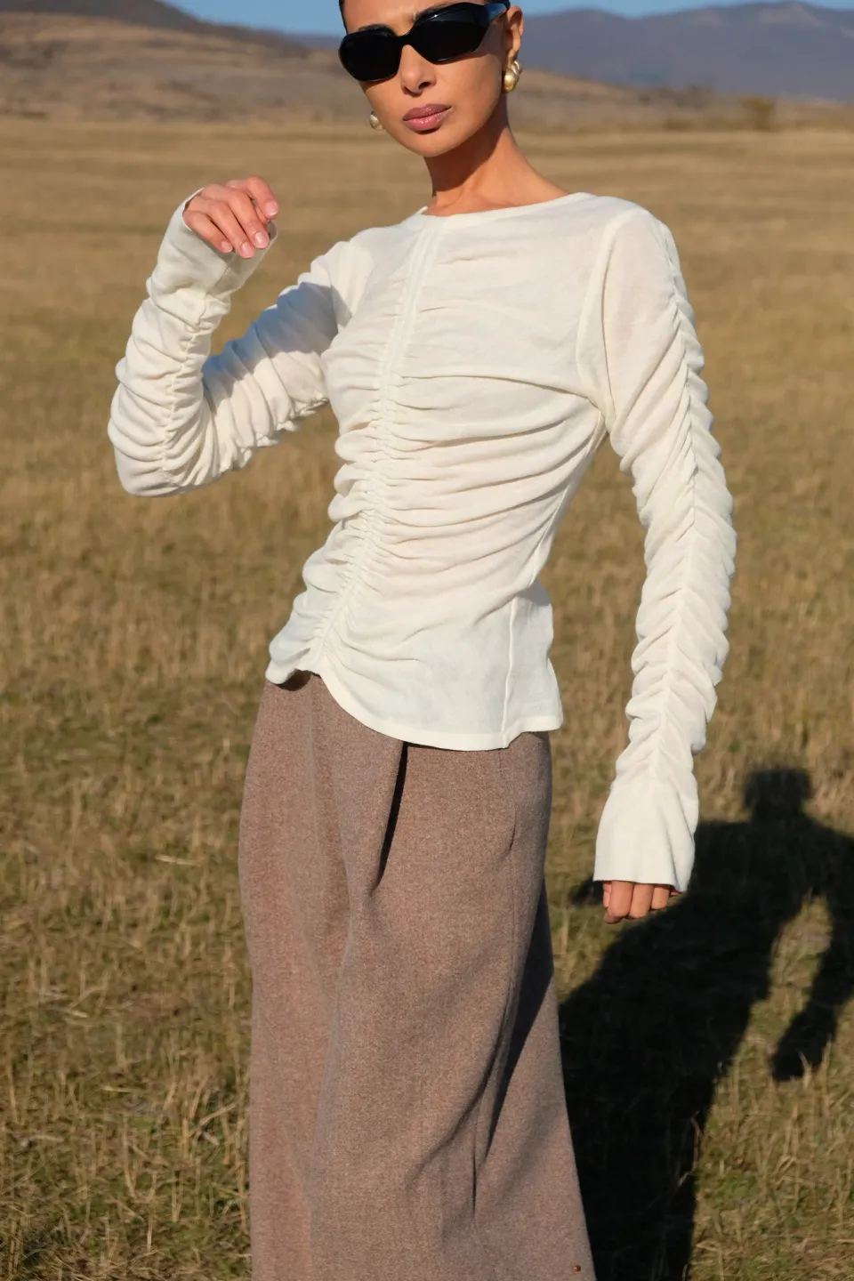 White ruffled top